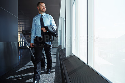 Buy stock photo Walking, flight or business man in airport thinking of company trip with suitcase or luggage for commute. Happy, window or corporate worker in hallway for journey or international travel with pride