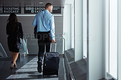 Buy stock photo Hall, walking or back of business people in airport with suitcase, luggage or baggage on company trip. Thinking, plane or corporate workers in lobby on global journey on international travel together