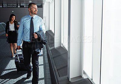 Buy stock photo Walking, smile or business man in airport thinking of company trip with suitcase or luggage for commute. Happy, people or corporate worker in hallway for journey or international travel with pride 