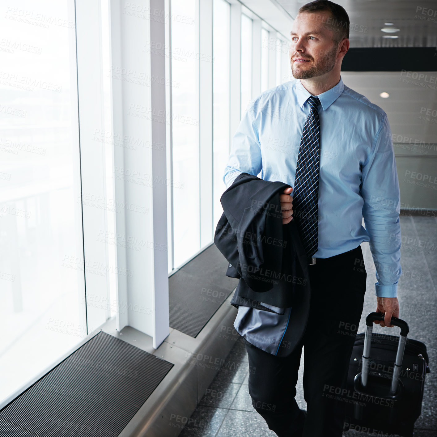 Buy stock photo Walking, flight or businessman in airport thinking of company trip with suitcase or luggage for commute. Proud manager, idea or corporate worker in hall for journey or international travel by window