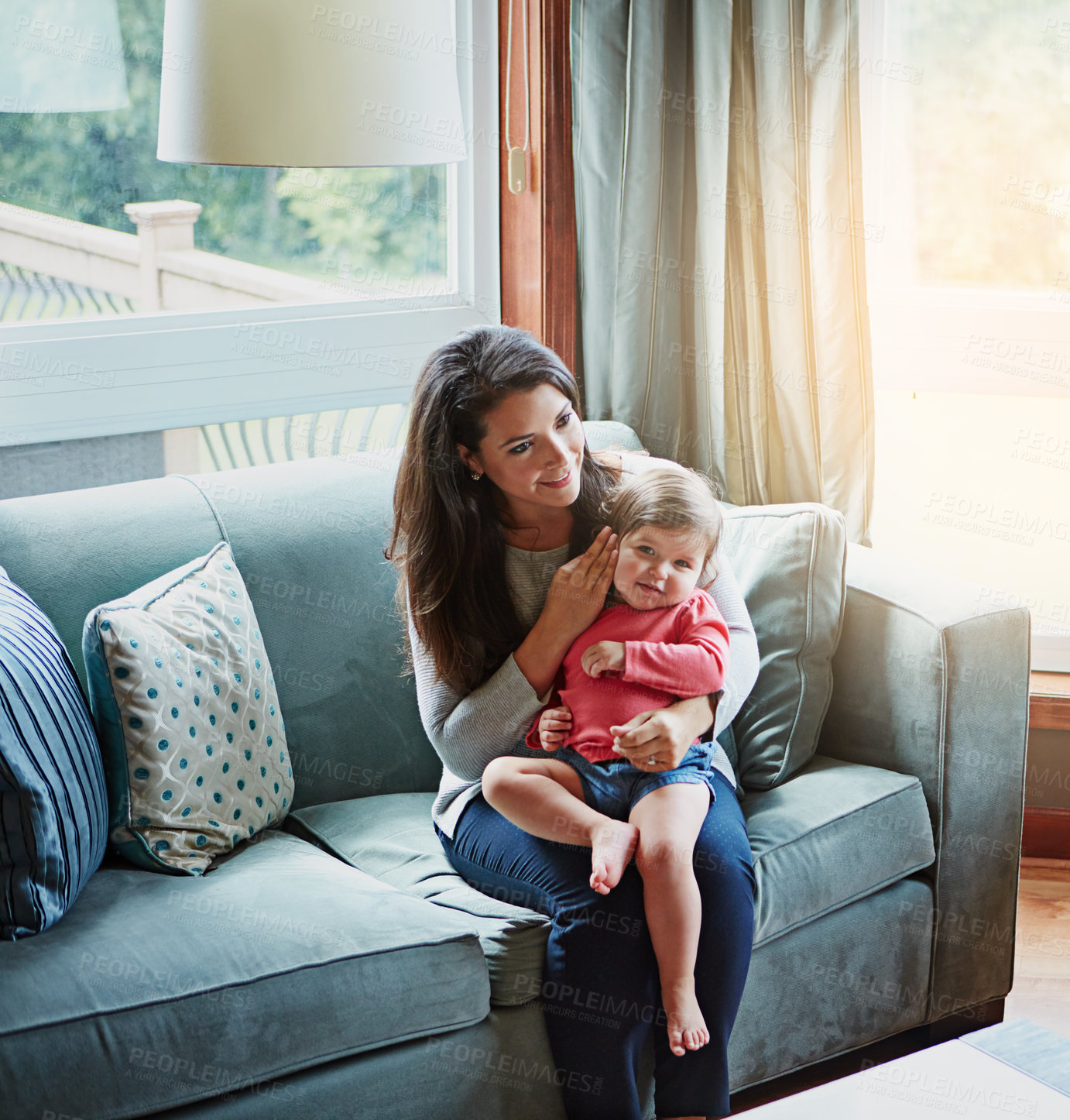 Buy stock photo Relax, happy and smile with mother and baby on sofa for bonding, quality time and child development. Growth, support and trust with mom and daughter in family home for health, connection and care