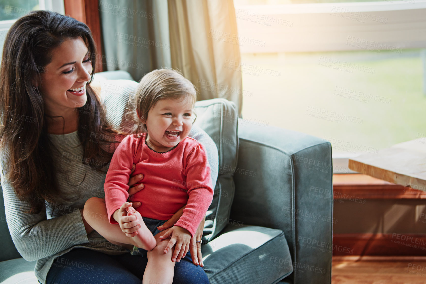 Buy stock photo Relax, happy and smile with mother and baby on sofa for bonding, quality time and child development. Growth, support and trust with mom and daughter in family home for health, connection and care