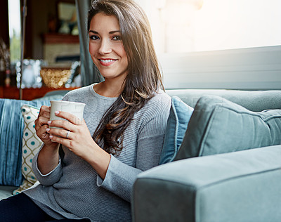 Buy stock photo Coffee, woman and portrait of a person at home on a living room sofa with a smile in the morning. Drink, happy person and lens flare on a lounge house couch with tea feeling happiness in a room