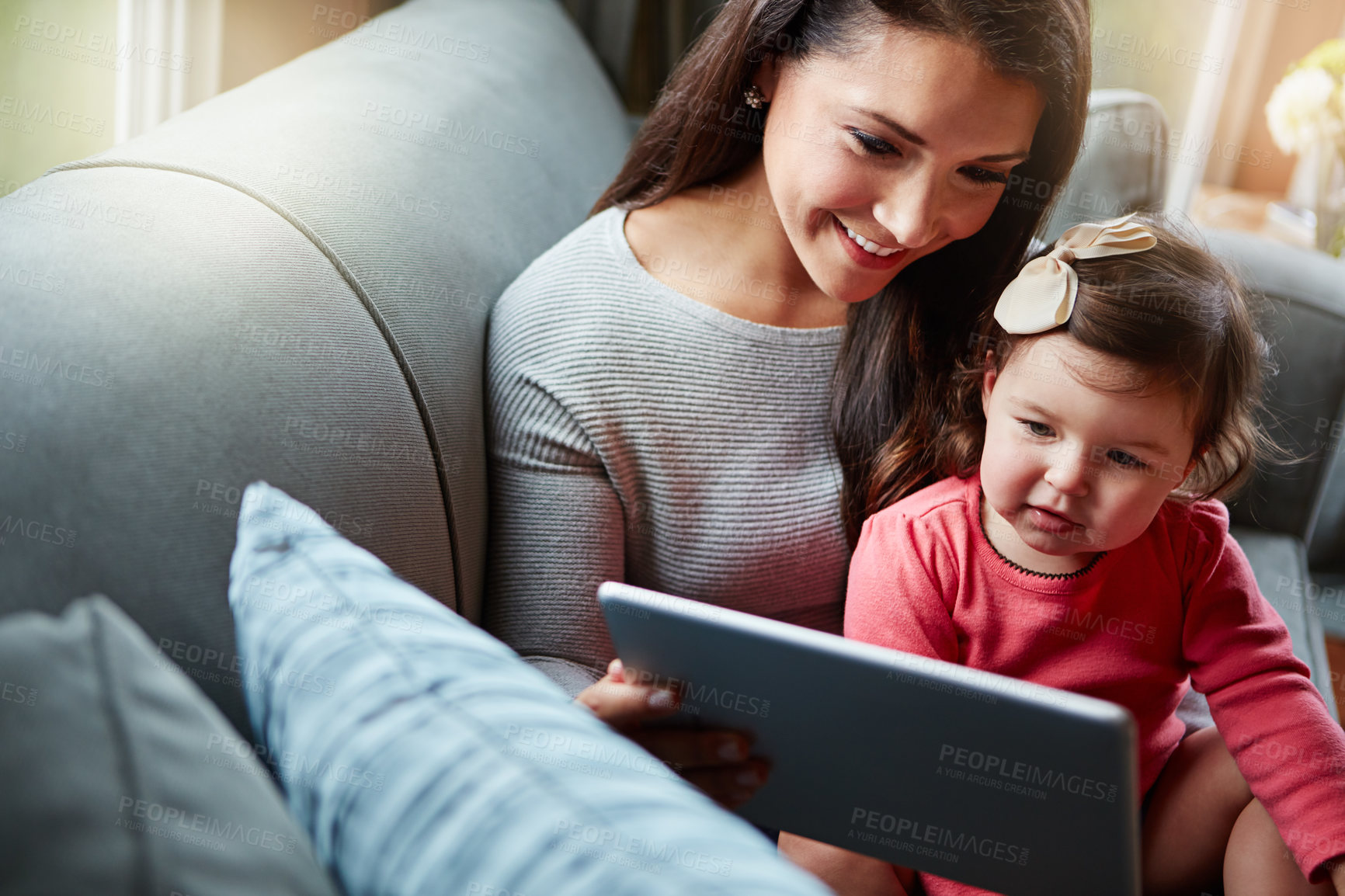 Buy stock photo Happy, sofa and mother with baby on tablet for online games, watching videos and streaming movies. Family, home and mom with young girl on digital tech for cartoons, bonding and relax together