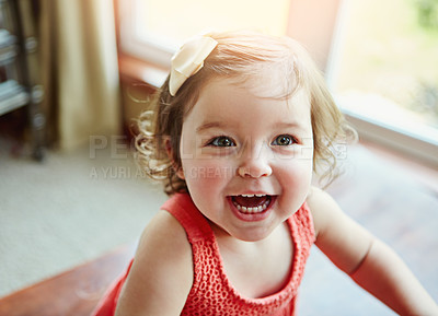 Buy stock photo Shot of an adorable little girl at home
