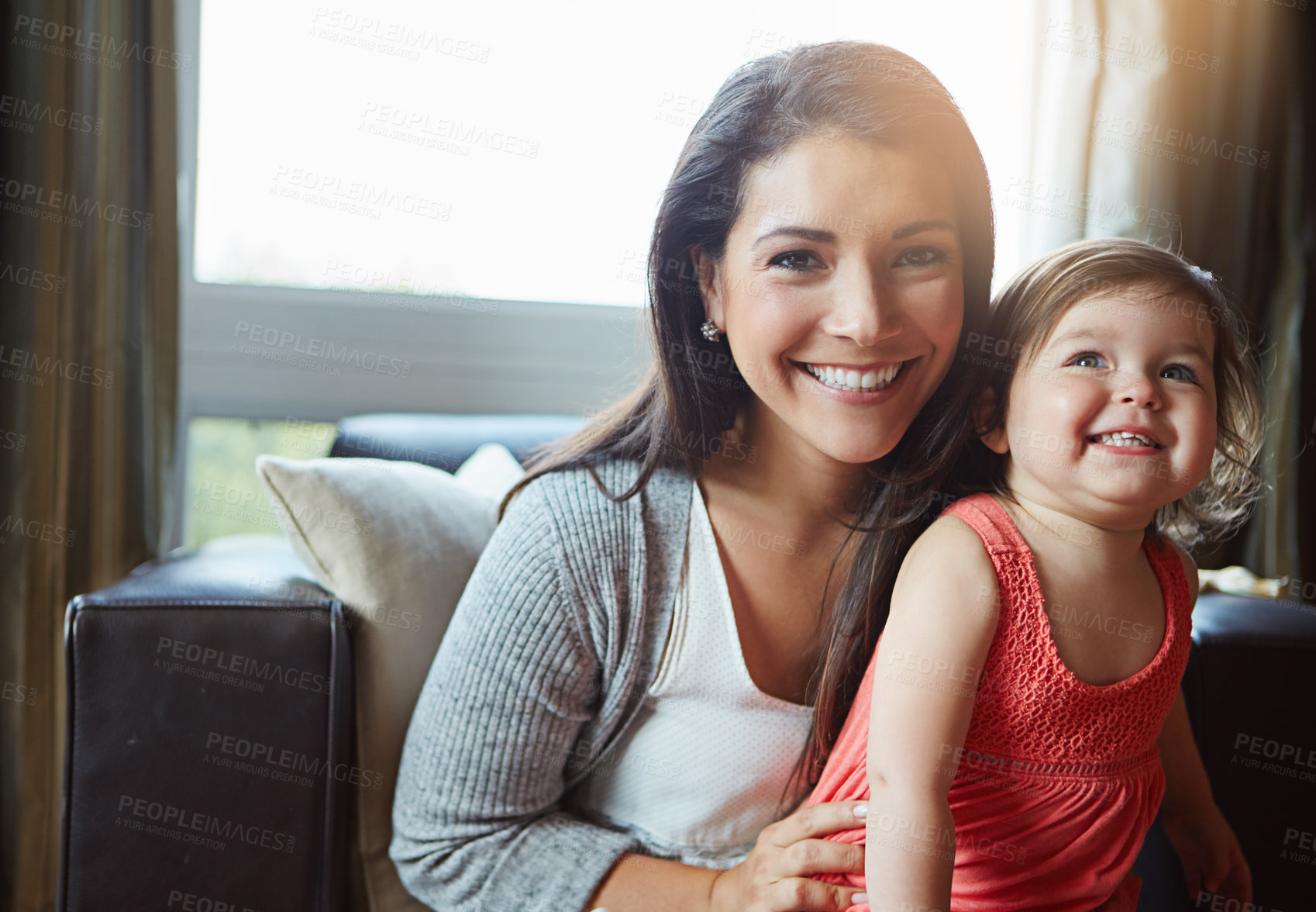 Buy stock photo Portrait, mother and girl child on sofa with smile for bonding, connection and development in home together. Happy, woman and daughter on couch with love for relationship, support and community