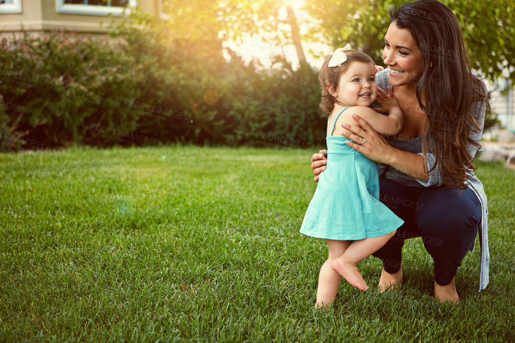 Buy stock photo Happy, mom and toddler with care in backyard for outdoor joy, growth and love in child development. Family, baby girl and woman with bonding in nature for fun, support and motherhood on weekend