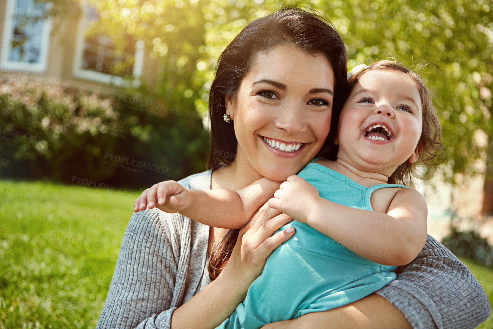 Buy stock photo Portrait of a mother bonding with her adorable little daughter outside