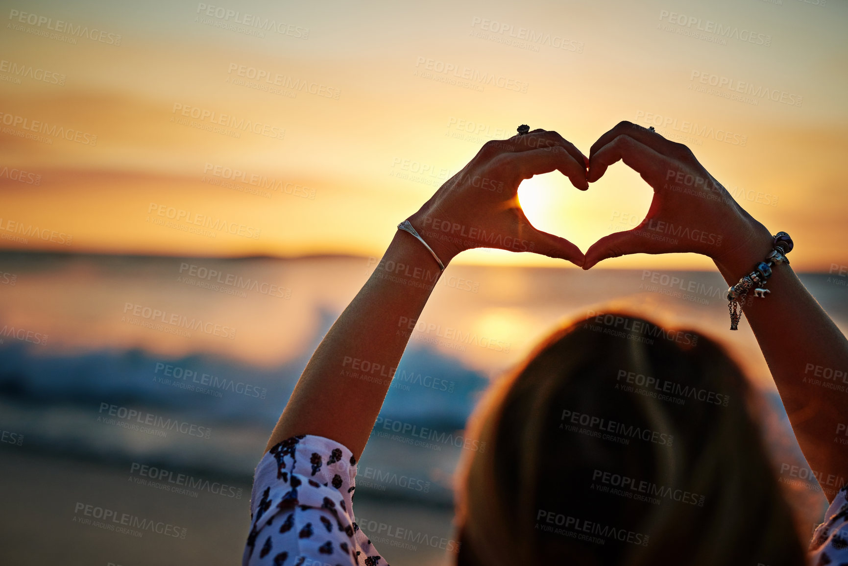 Buy stock photo Shot of an unecognizable woman on the beach