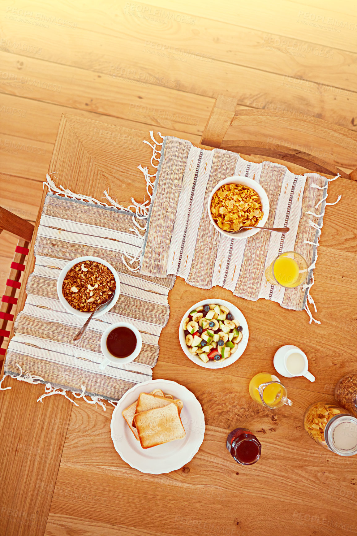 Buy stock photo High angle shot of an empty table set with breakfast foods