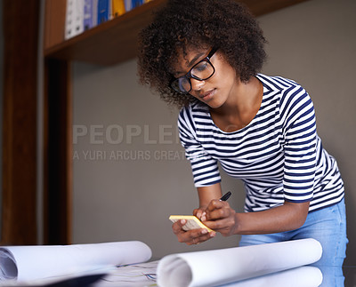 Buy stock photo Woman, home and writing on notepad with plans, business and remote work from living room. Strategy, architect and African female person serious and concentrated for architecture by black worker