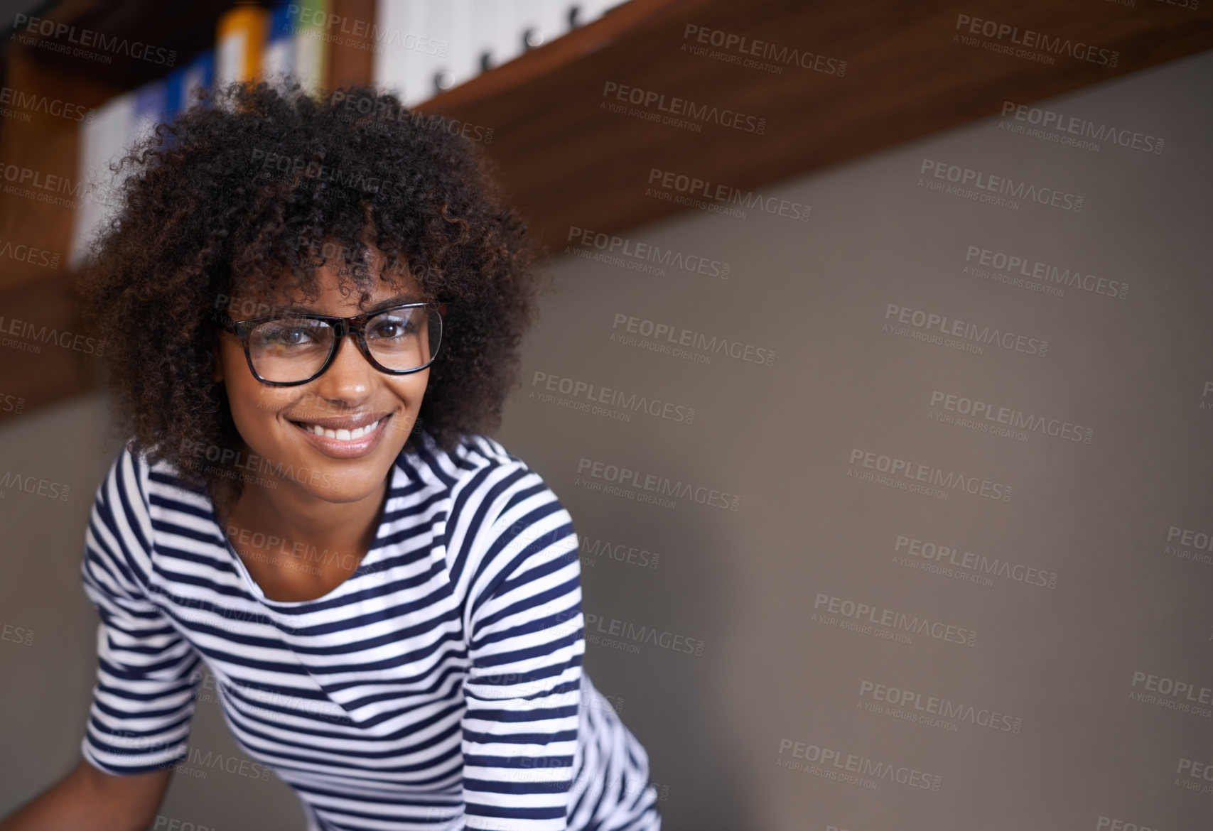 Buy stock photo Portrait, smile and space with designer black woman in small business office for creative administration. Face, glasses and artistic with happy young afro person in startup workplace for design