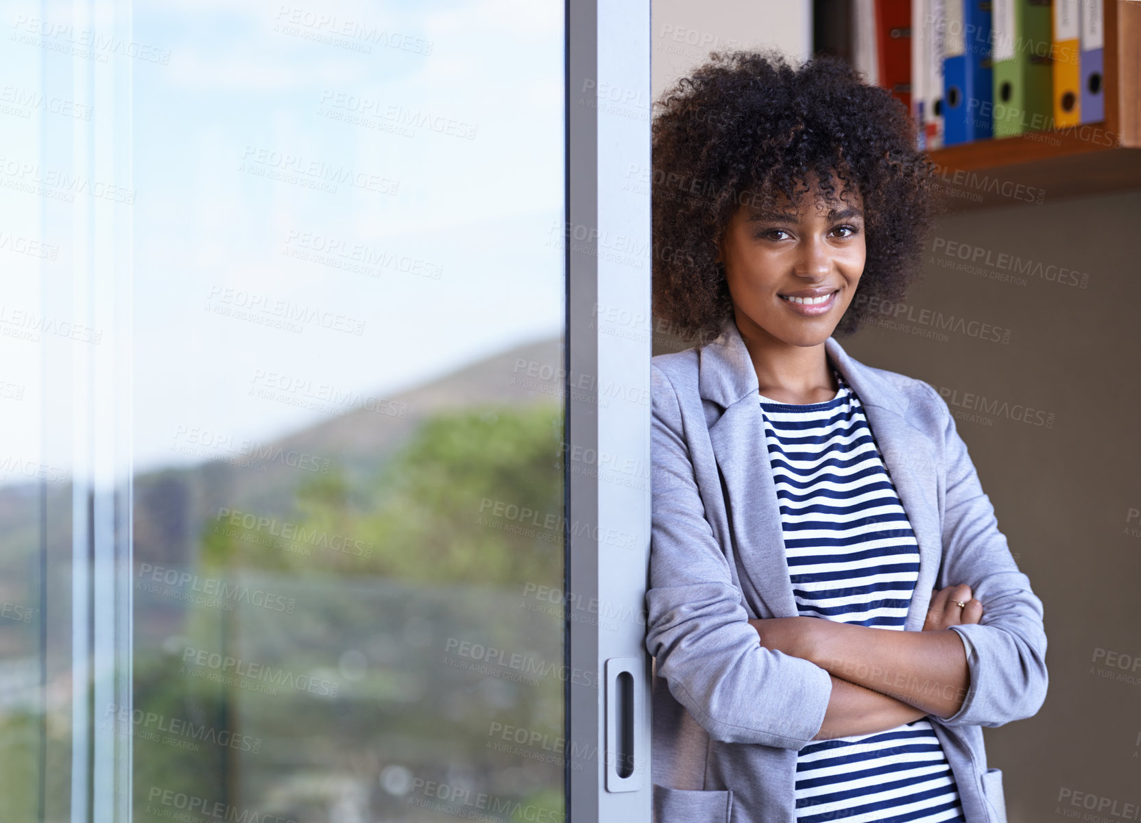 Buy stock photo Black woman, designer and portrait in startup business for entrepreneur, smile or creative company. Face, arms crossed and young afro female person for confidence, happiness and pride in workplace