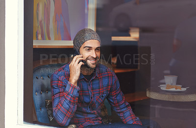 Buy stock photo Phone call, smile and man by cafe window for communication, conversation or networking. Happy, technology and male person talking for mobile discussion with cellphone in coffee shop or restaurant.