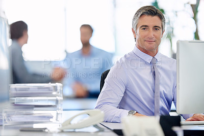 Buy stock photo Cropped shot of businesspeople working in the office