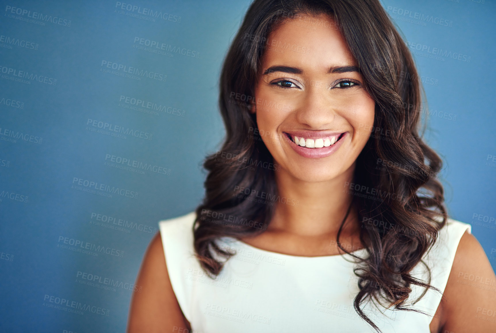 Buy stock photo Studio, portrait or business woman with smile for profession, job and career for corporate worker. Female employee, intern or positive for administration, work opportunity or happy by blue background