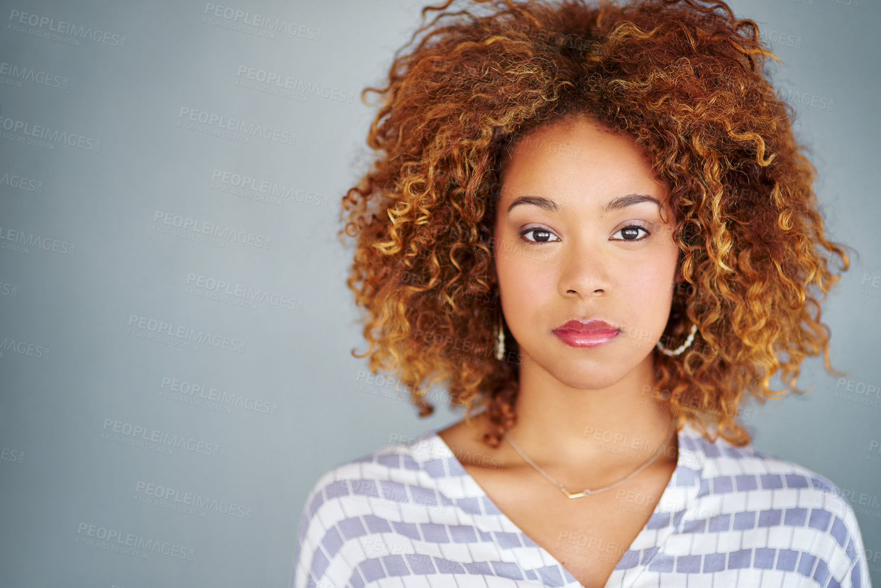 Buy stock photo Portrait, serious and creative business woman isolated on a gray background mockup space. Confident face, professional and designer, entrepreneur or young worker at startup office in South Africa