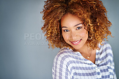 Buy stock photo Portrait, happy and young business woman isolated on a gray background mockup space. Face, professional smile and creative designer, entrepreneur or female employee working at startup in South Africa