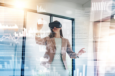 Buy stock photo Shot of a young businesswoman wearing a VR headset while connecting to a user interface