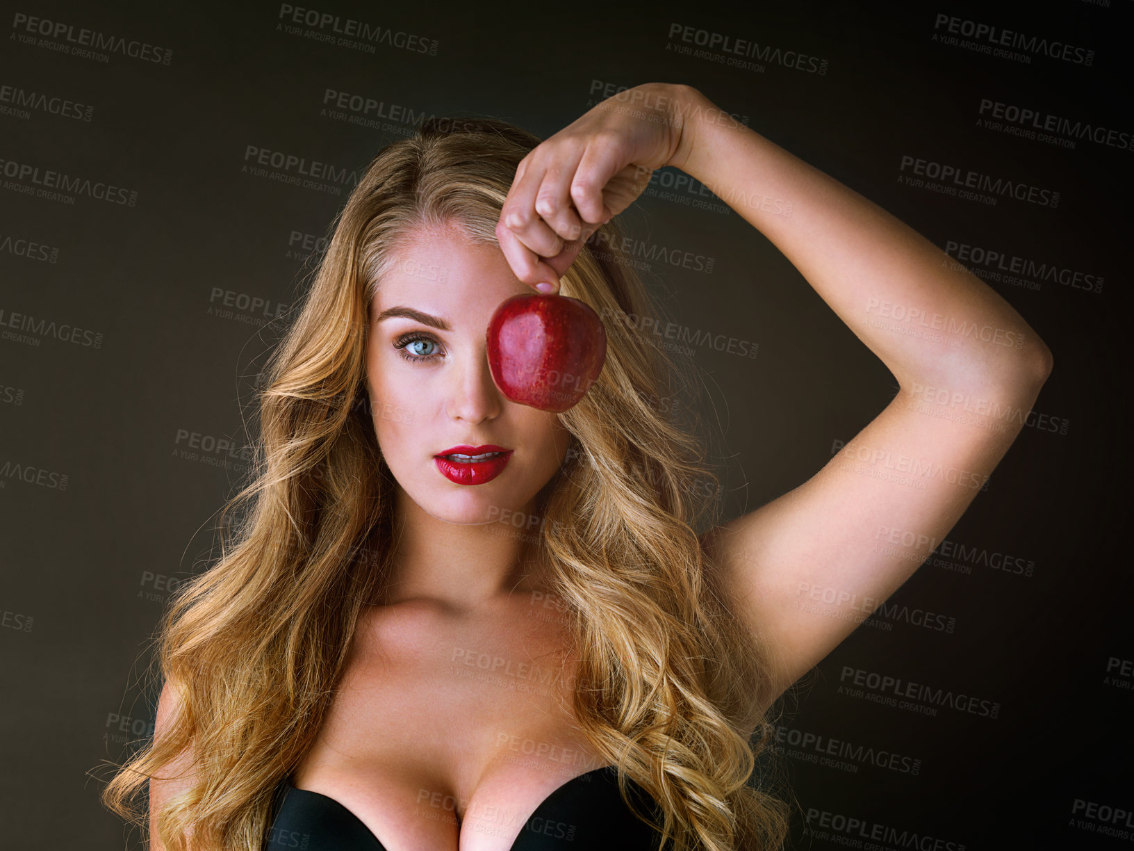 Buy stock photo Woman, beauty portrait and lingerie with apple for body wellness, detox and antioxidant for weight loss. Model, person and forbidden fruit for temptation, desire and underwear on studio background