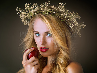 Buy stock photo Woman, portrait and beauty with apple on studio backdrop for eating, organic cosmetics and natural dermatology for alluring feel. Makeup, girl and forbidden fruit on dark background for nutrition.