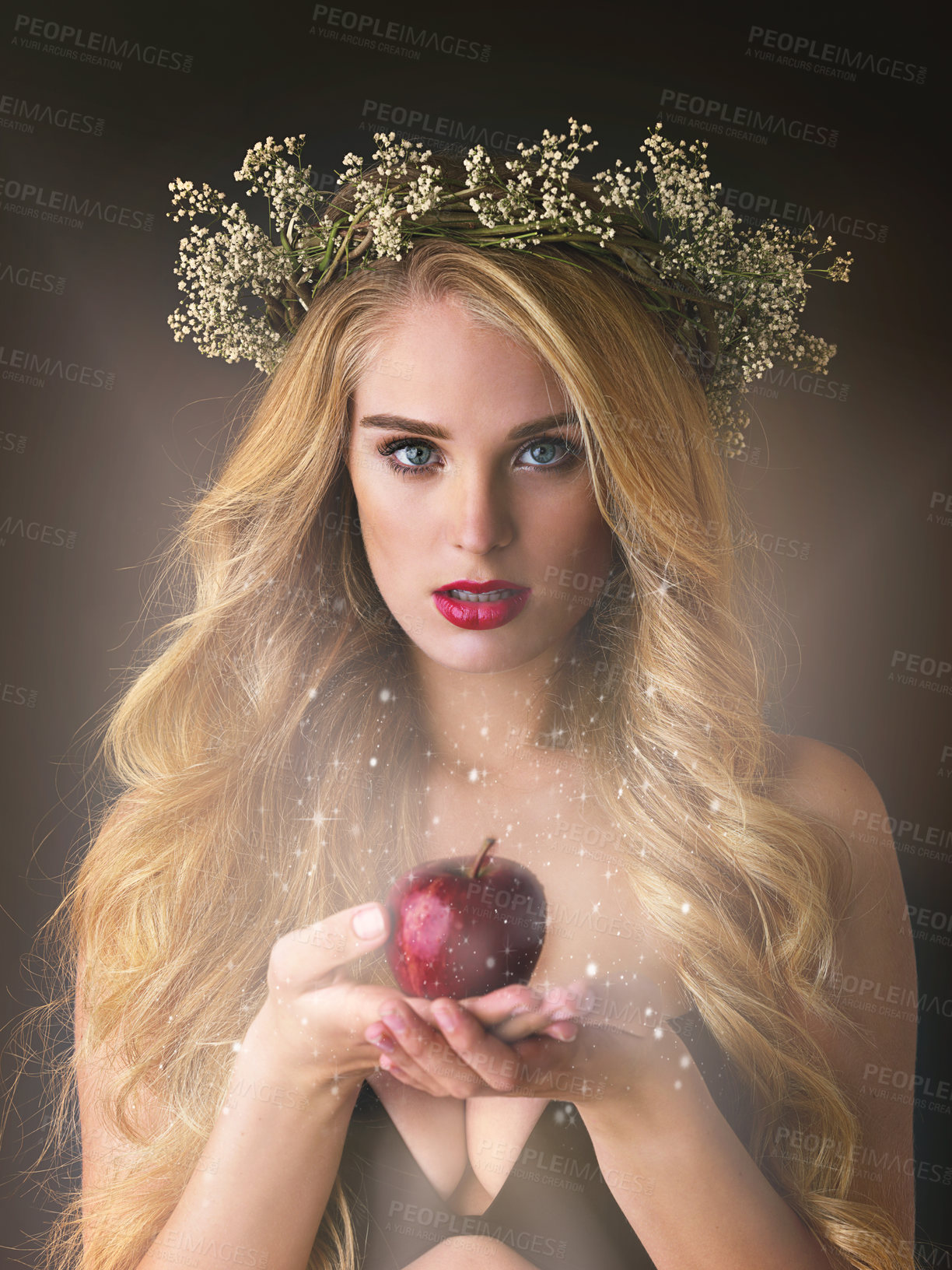 Buy stock photo Portrait, flower crown and beauty of woman with apple isolated on black studio background. Face, food and girl with forbidden fruit for magic fantasy, temptation or sin of model in wreath with makeup
