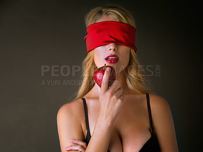 Buy stock photo Woman, sexy and seductive with apple in studio with blindfold, bold beauty and red lipstick for nutrition health. Female person, mysterious and erotic food with forbidden fruit on black background