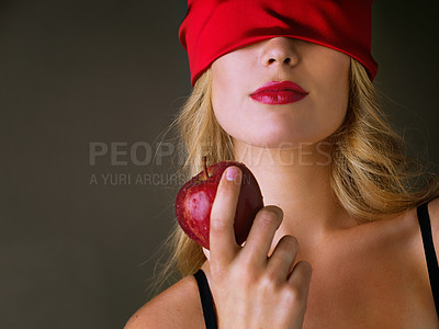 Buy stock photo Apple, sexy and woman seductive in studio with blindfold, bold beauty and red lipstick for nutrition health. Female person, mysterious and erotic food with forbidden fruit on black background