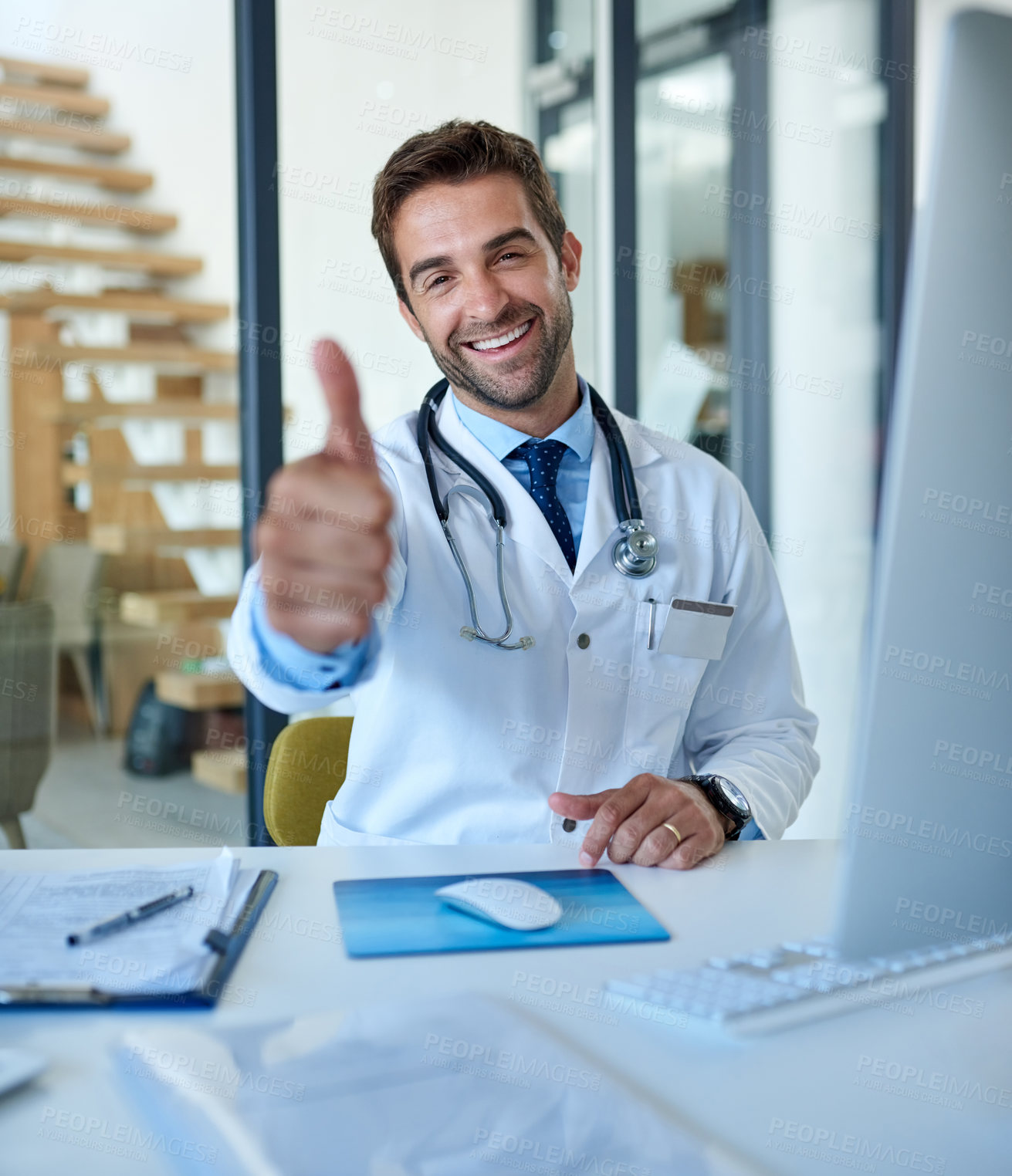 Buy stock photo Portrait, doctor or man at desk with thumbs up for support, trust or agreement in healthcare office. Smile, help and medical professional with ok hand sign, emoji or vote for happy hospital service