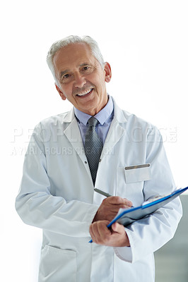 Buy stock photo Portrait of a mature doctor standing in a hospital