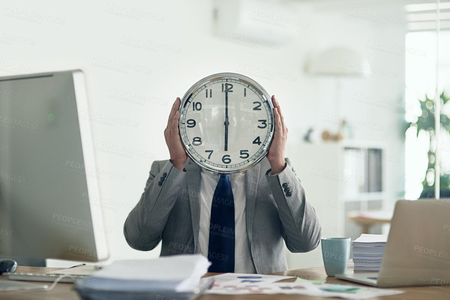 Buy stock photo Business man, clock head and office with computer, documents and stress for deadline at accounting agency. Person, watch and cover face for time management, pressure and reminder for schedule at job