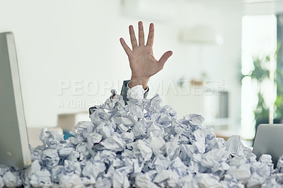 Buy stock photo Shot of an unidentifiable businessman drowning under a pile of paperwork in the office