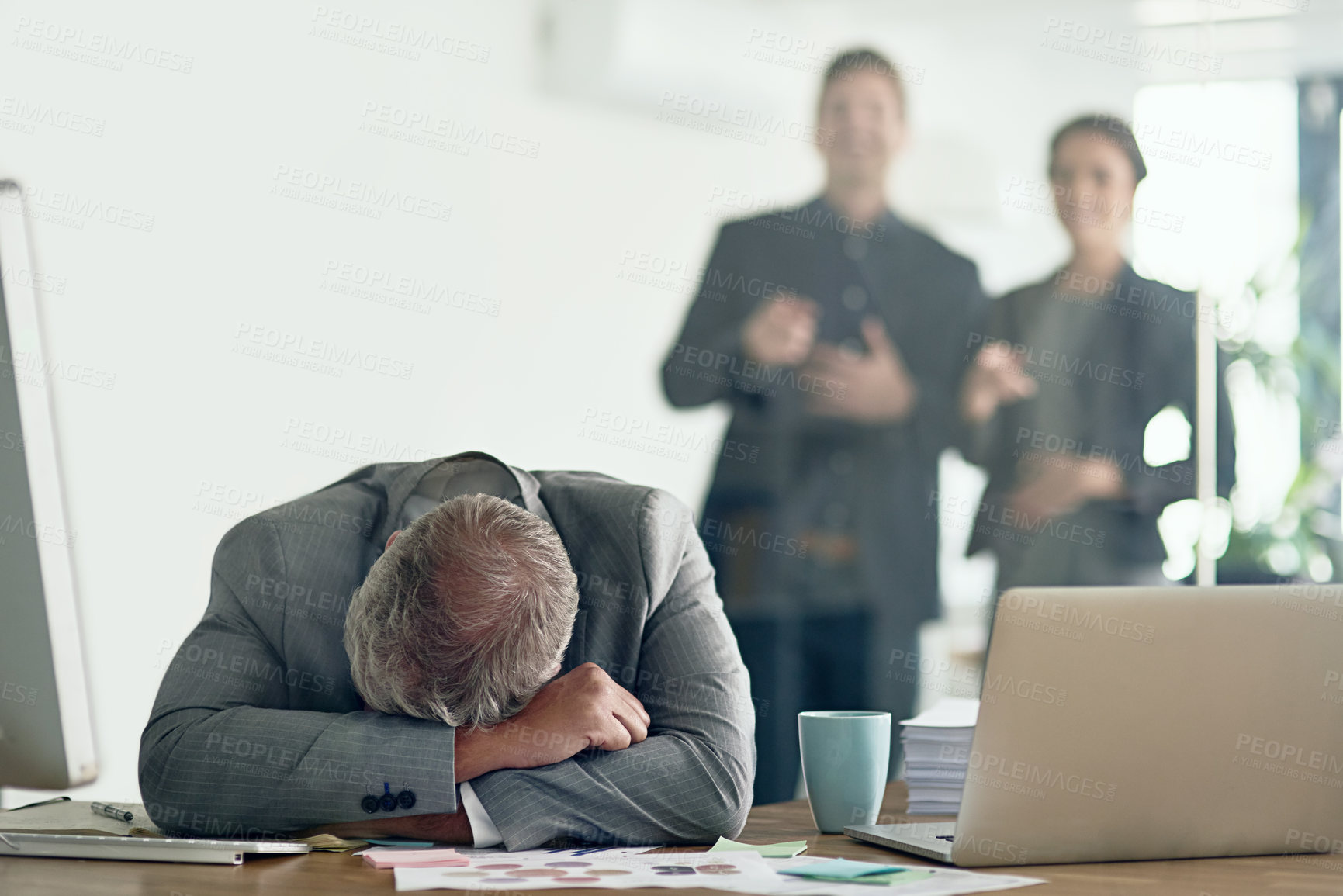 Buy stock photo Mature business man, sleeping and office with people for laughing, bullying and joke for age at accounting agency. Stress, fatigue and burnout with rest and fear of mocking coworkers at workplace