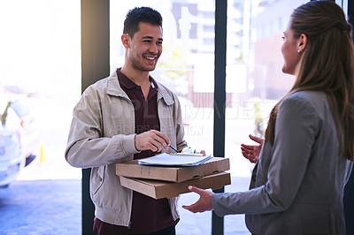 Buy stock photo Cropped shot of a man making a pizza delivery to a businesswoman at work