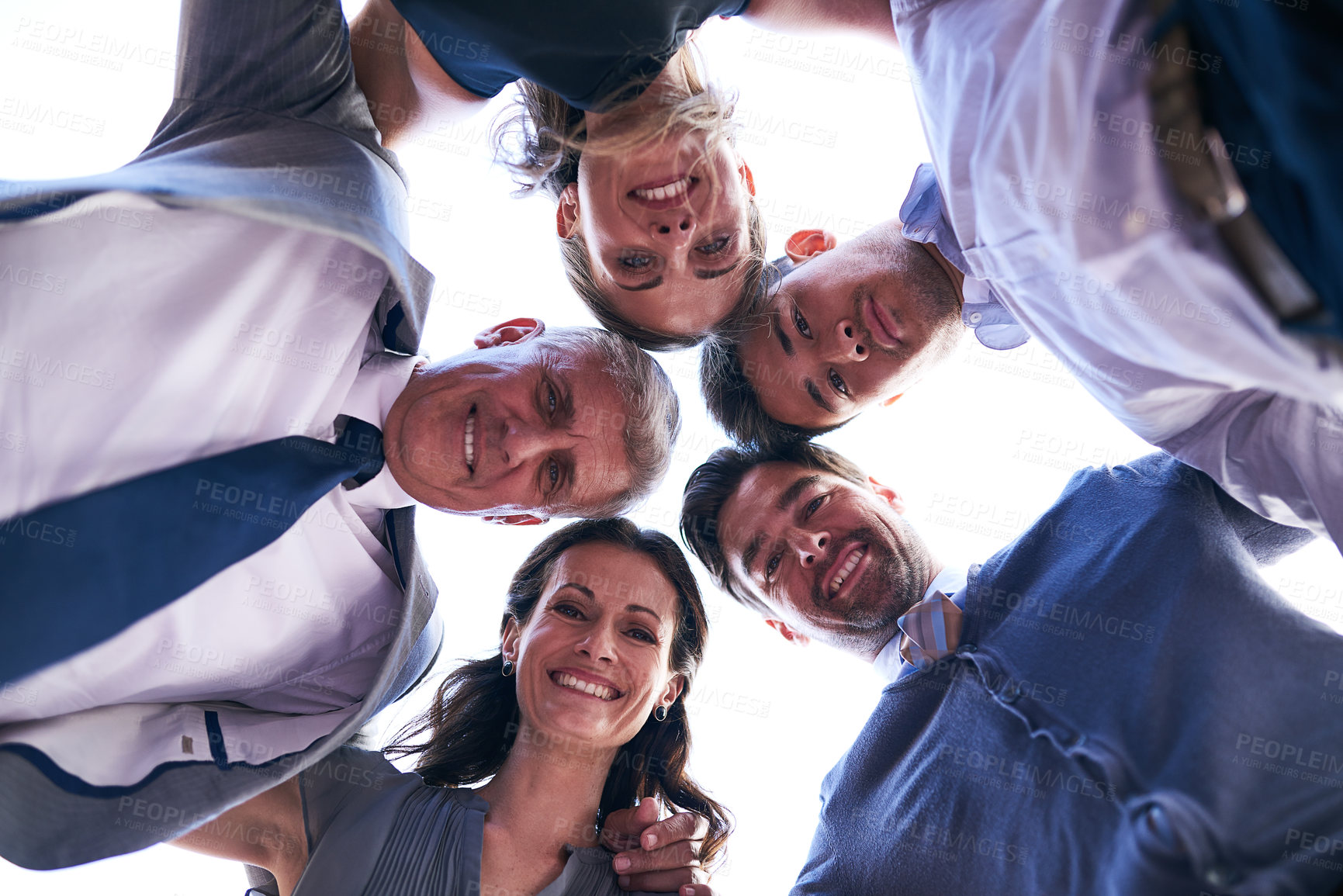 Buy stock photo Portrait, collaboration and happy business people in huddle for motivation with mission, brainstorming and support. Team building, below and partnership in meeting for goals, solidarity or planning