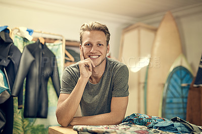 Buy stock photo Portrait of a young shopkeeper posing in his surf shop