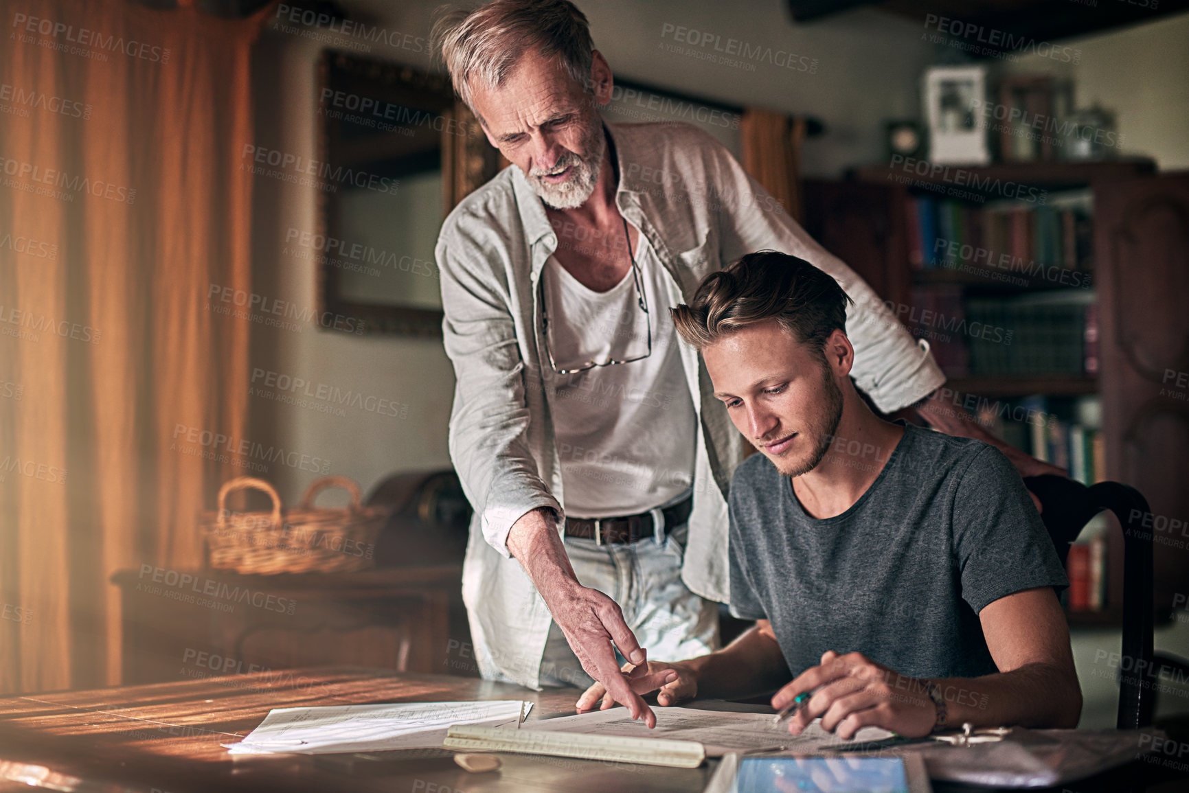 Buy stock photo Architect, senior father and son with plans for home improvement, renovation and design in office. Elderly mentor, apprentice and man at desk for creativity, brainstorming and idea in family business