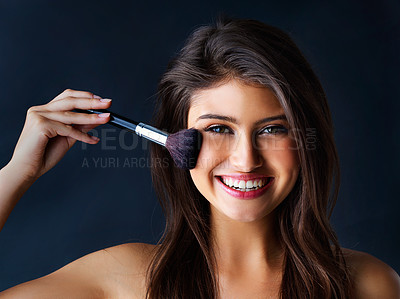 Buy stock photo Woman, makeup and brush with portrait in studio for beauty glamour, salon and foundation product of transformation. Girl, smile and facial tool of cosmetic routine, aesthetic and blue background