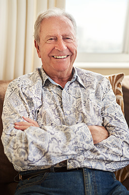 Buy stock photo Portrait of a happy senior man relaxing on the sofa at home