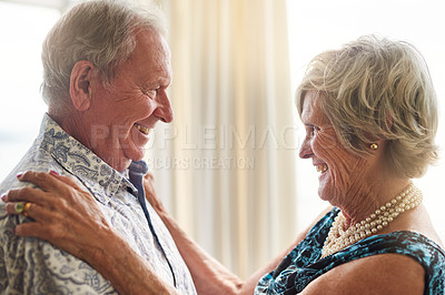 Buy stock photo Dance, love and smile with senior couple in living room of retirement home for bonding or security. Anniversary, fun or music with elderly man and woman in apartment together for safety or trust
