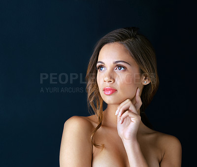 Buy stock photo Skincare, thinking and woman in studio with makeup, confidence and healthy glow on mockup space. Beauty, dermatology and face of girl with luxury cosmetics, inspiration and shine on blue background