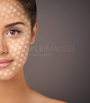 Buy stock photo Enhanced portrait of a beautiful model with perfect skin posing in studio