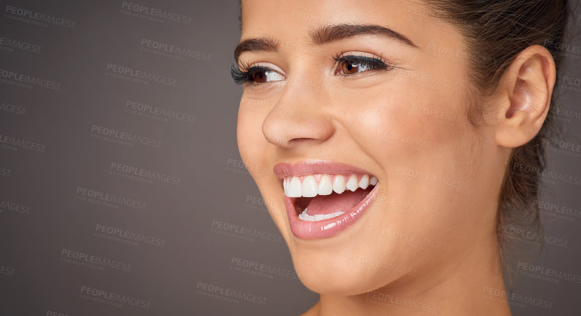 Buy stock photo Beauty, thinking and woman in studio with makeup for skin glow, natural cosmetics or routine on gray background. Mockup, foundation and female model with happiness for self care, shine or remember