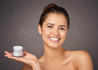 Buy stock photo Cream, beauty and portrait of woman with jar for skincare, wellness and facial minerals on gray background. Dermatology, happy and person with moisturizer, lotion and anti aging cosmetics in studio