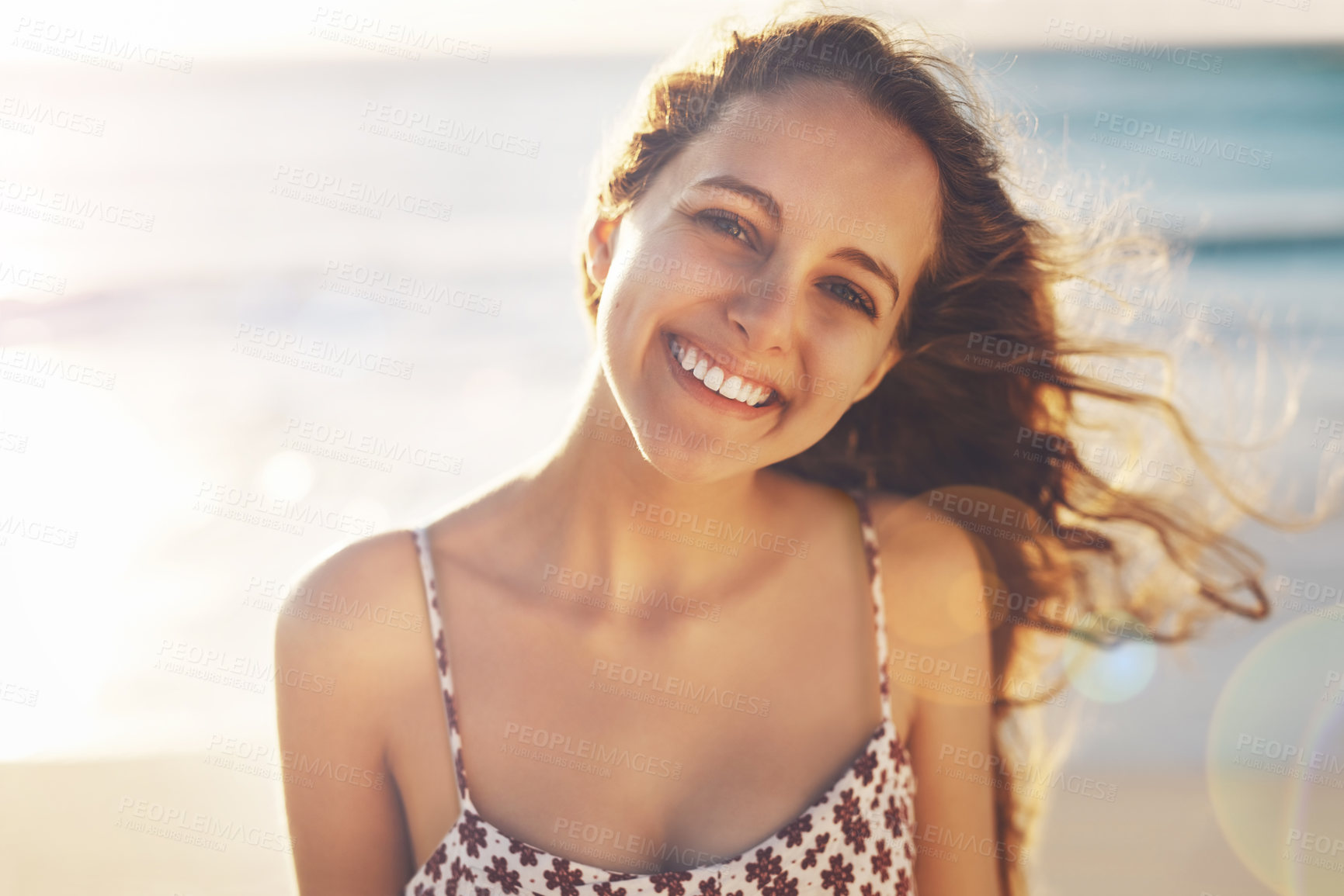 Buy stock photo Woman, portrait and wind at beach on vacation, water and travel to Bali for holiday at sea. Happy female person, peace and waves on trip in outdoor nature, tropical island and tourist relax by ocean