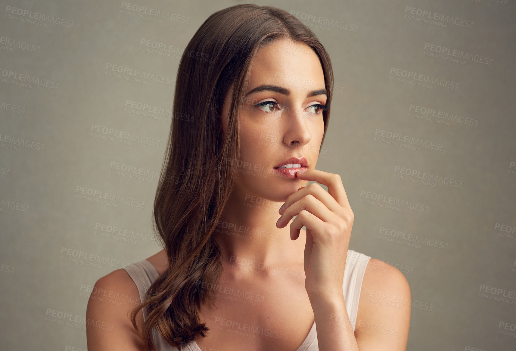 Buy stock photo Hair care, thinking and woman in studio with shine for keratin treatment, shampoo or hairstyle idea on brown background. Beauty, aesthetic and model for natural glow, cosmetics or healthy texture