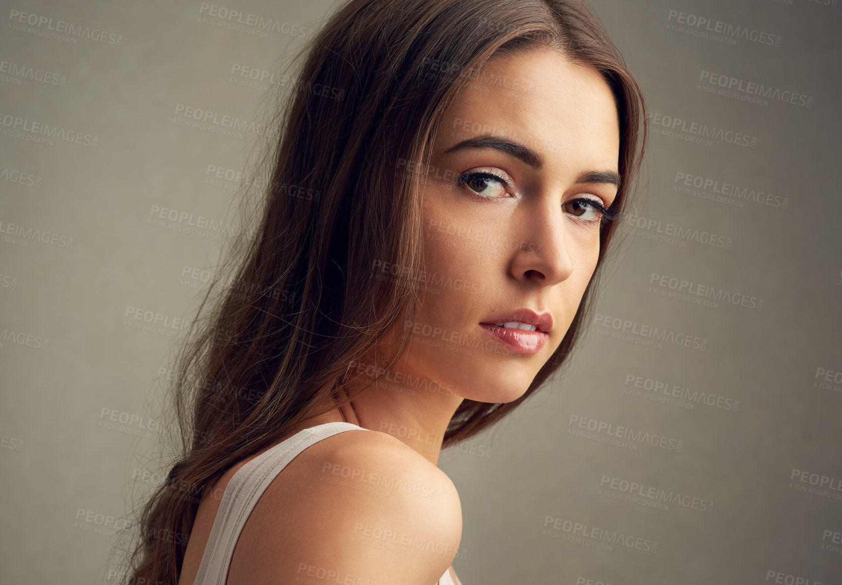 Buy stock photo Studio, natural and woman in portrait for hair care, collagen and treatment with benefits for healthy texture. Girl, cosmetics and shine for shampoo with pride, beauty and growth by brown background