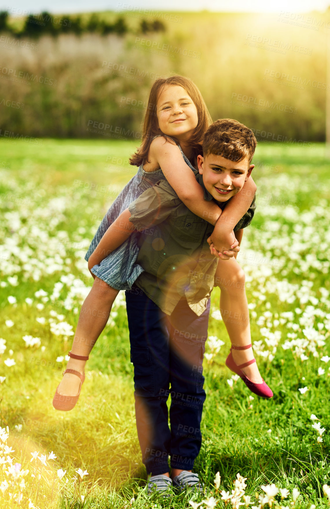 Buy stock photo Siblings, portrait and piggyback with smile in park together for support, bonding and playing in summer. Kids, boy and girl in nature, garden and countryside for kindness as brother and sister