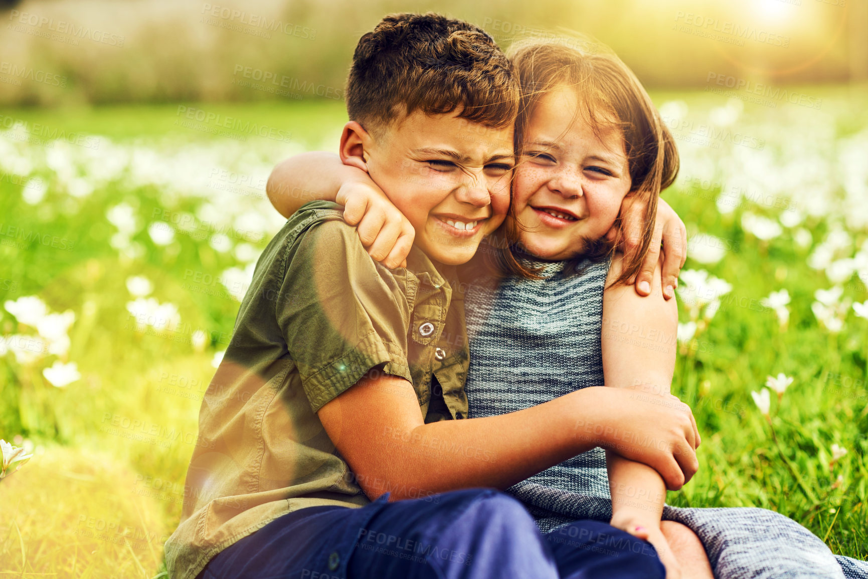 Buy stock photo Siblings, kids and hug with smile in park together for support, bonding and playing in summer. Children, boy and girl for love in nature, garden and countryside for kindness as brother and sister