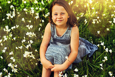 Buy stock photo Grass, girl and child in portrait for relaxing, resting and enjoying outdoor in park. Nature, backyard and flowers in countryside with happy kid on vacation, summer break and peaceful with smile